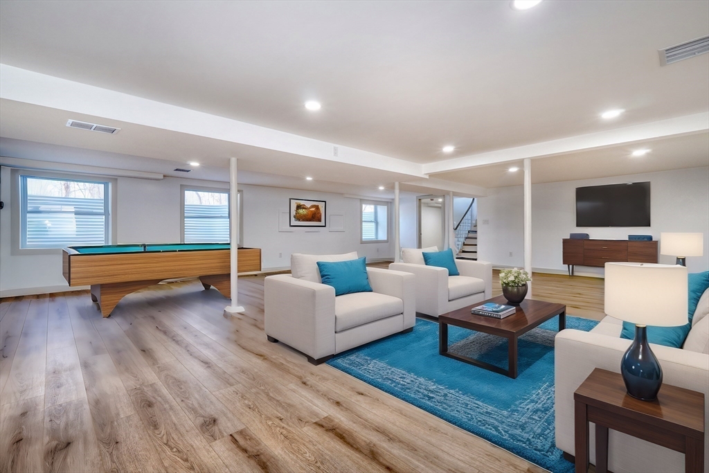 6 Spring Lane Saugus, MA 01906 - Photo 28 of 37 a living room with furniture and a wooden floor