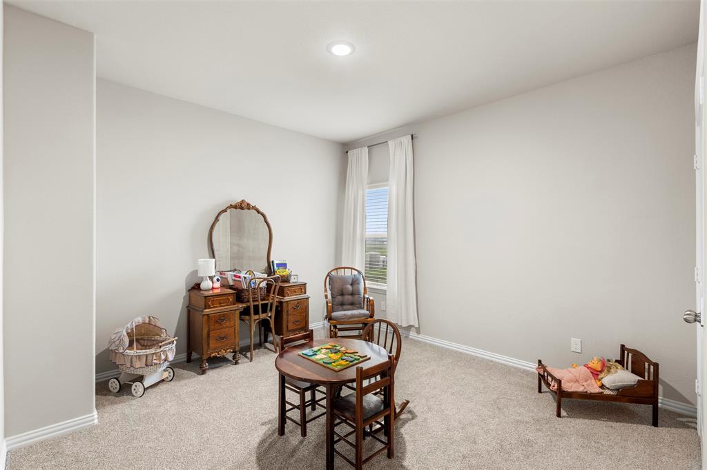 107 Yampa Court Rhome, TX 76078 - Photo 16 of 30 Spacious room featuring neutral carpeting, light-colored walls, and a recessed ceiling light