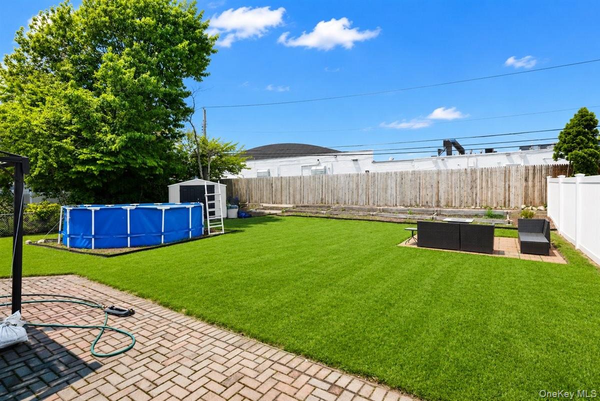 11 Adelphi Road Hicksville, NY 11801 - Photo 26 of 26 a view of a backyard with a garden