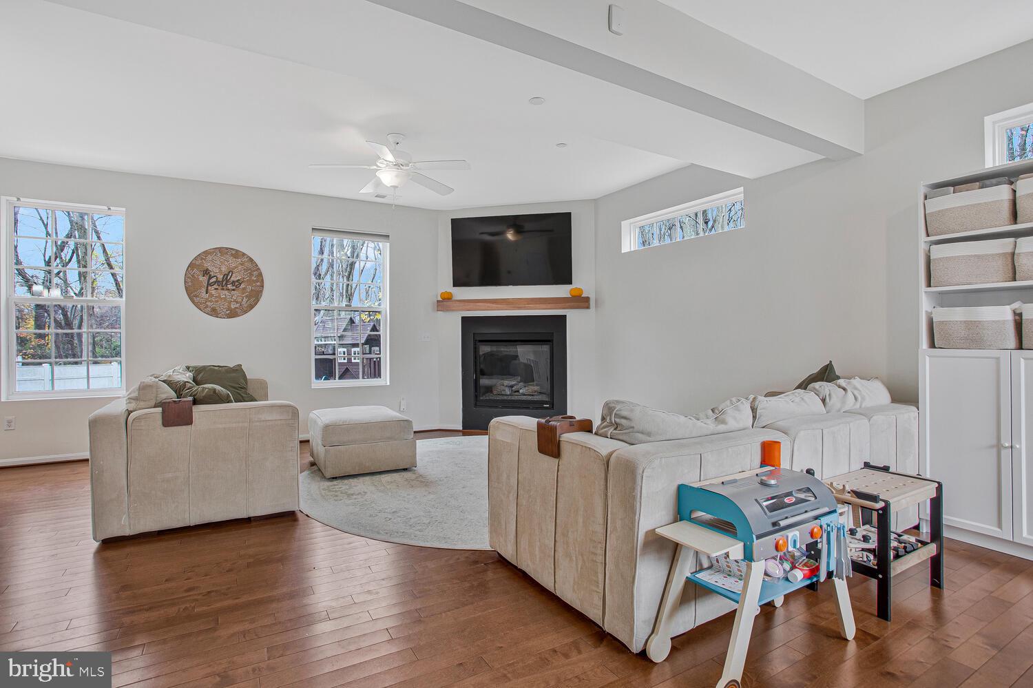 703 Trapper Way Deale, MD 20751 - Photo 3 of 18 a living room with furniture and a flat screen tv