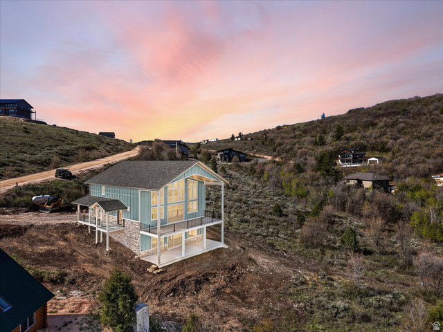 1159 North Broad Hollow Road Garden City, UT 84028 - Photo 16 of 55 Contemporary architectural style with a gabled roof and light blue vertical siding