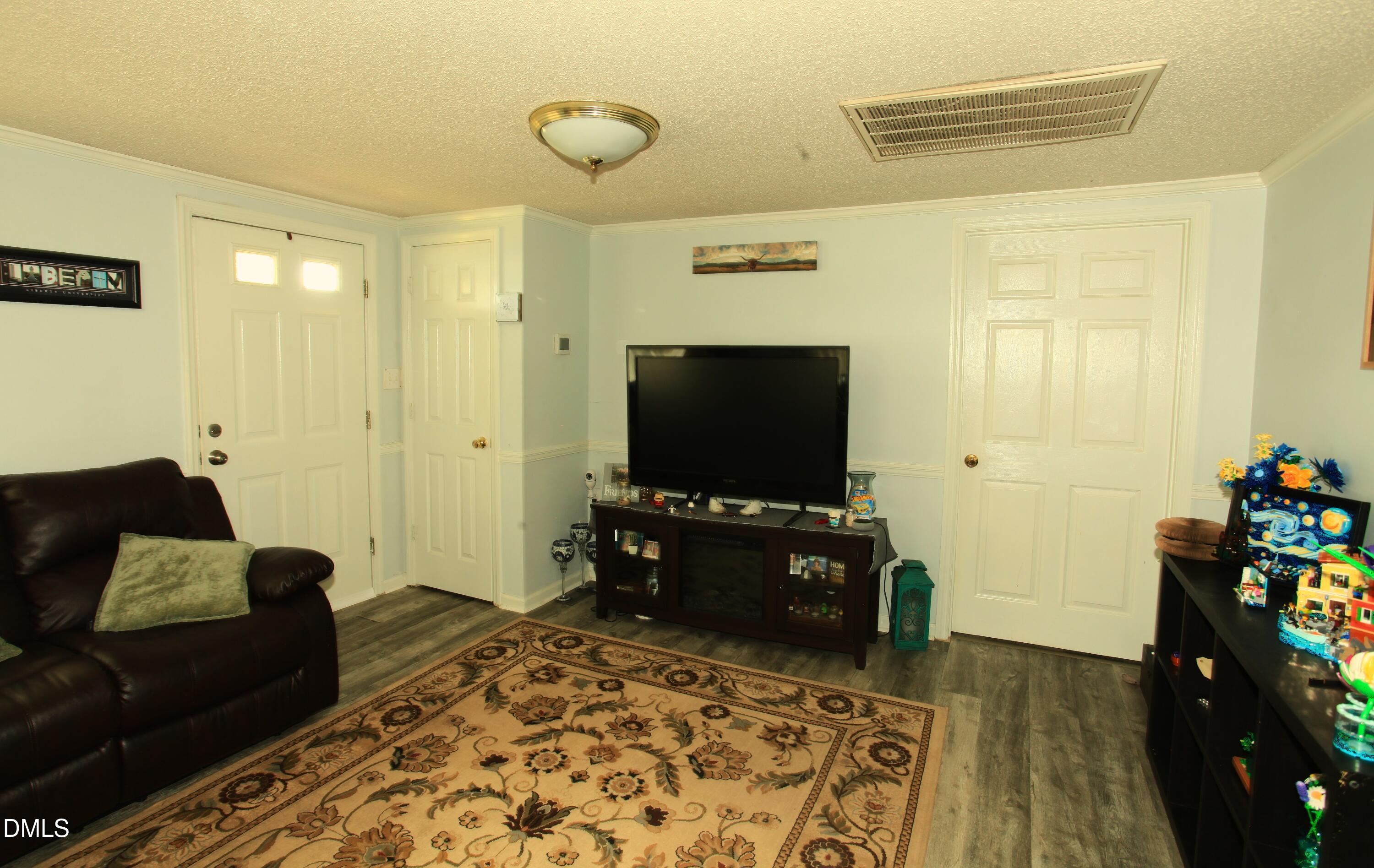 2351 Mt Pleasant Road Willow Spring, NC 27592 - Photo 37 of 39 Renter's living room