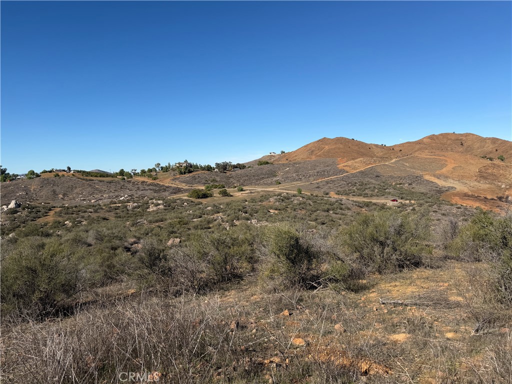 0 Blue Sky Road Perris, CA 92570 - Photo 7 of 14 a view of a mountain in the distance in a field