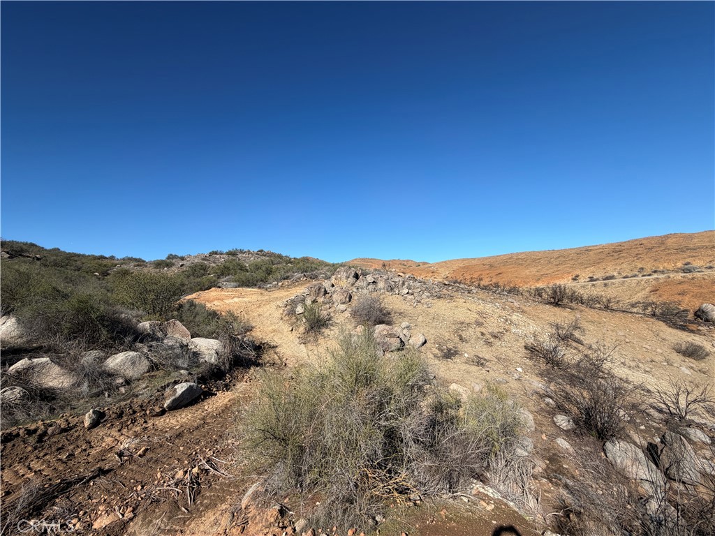 0 Blue Sky Road Perris, CA 92570 - Photo 10 of 14 a view of a mountain range with trees in the background