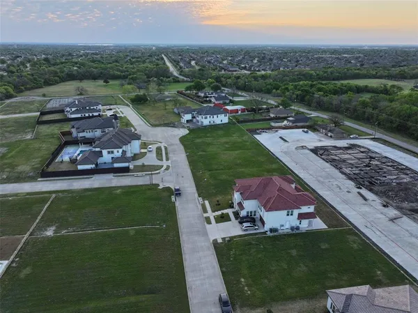 an aerial view of a house with a garden