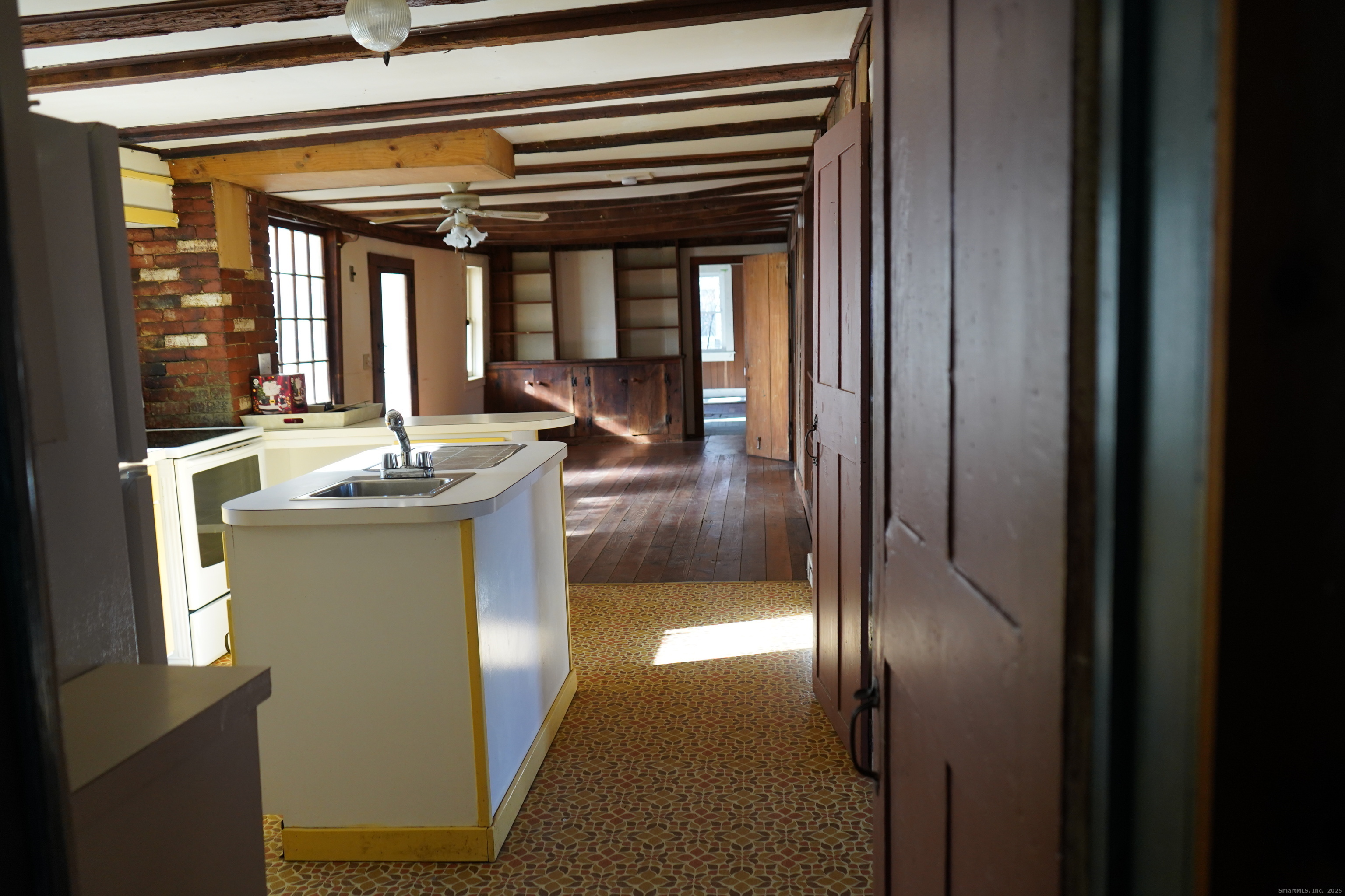 363 Windham Road Windham, CT 06226 - Photo 11 of 28 a living room with a large window and furniture