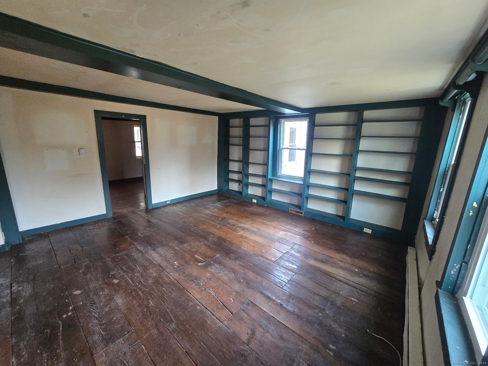 363 Windham Road Windham, CT 06226 - Photo 21 of 28 wooden floor in an empty room with a window