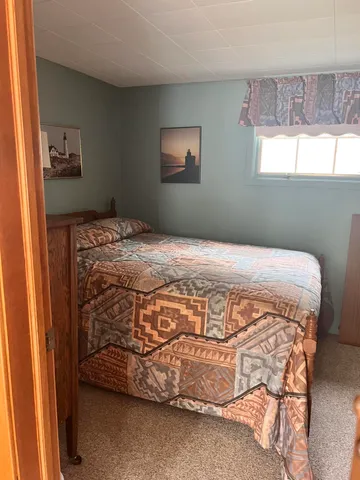 $159,900 | 8376 West Pine Grove Beach Drive, Baldwin, MI 49304