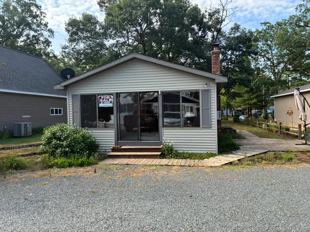 $159,900 | 8376 West Pine Grove Beach Drive, Baldwin, MI 49304