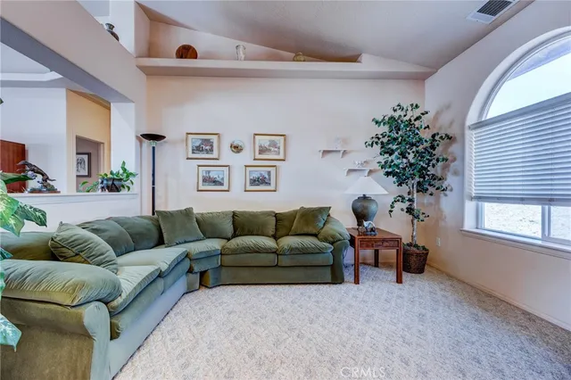 a view of kitchen with furniture and window