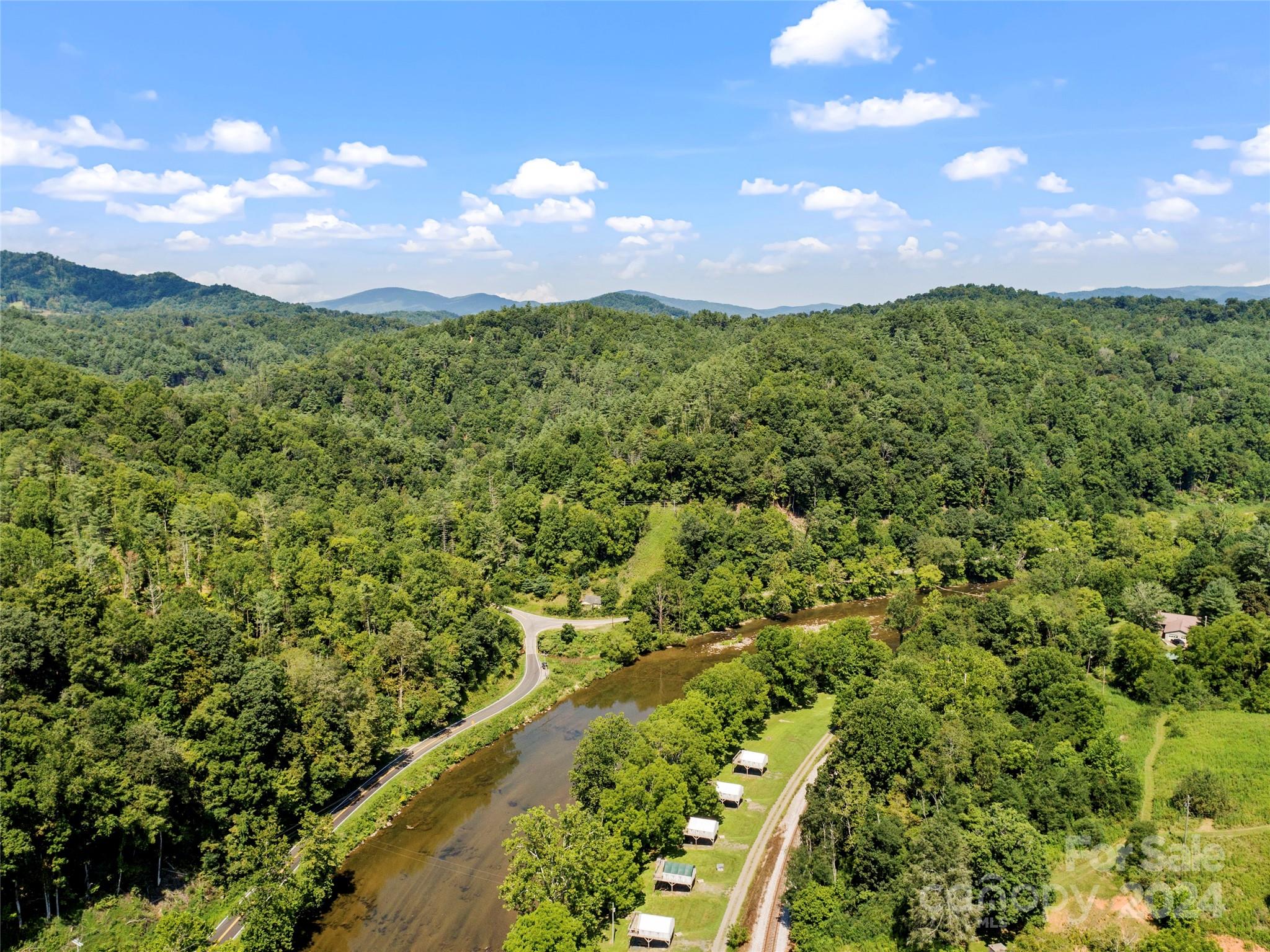 1471 Toe River Road Green Mountain, NC 28740 - Photo 36 of 44 a view of a houses with sky view