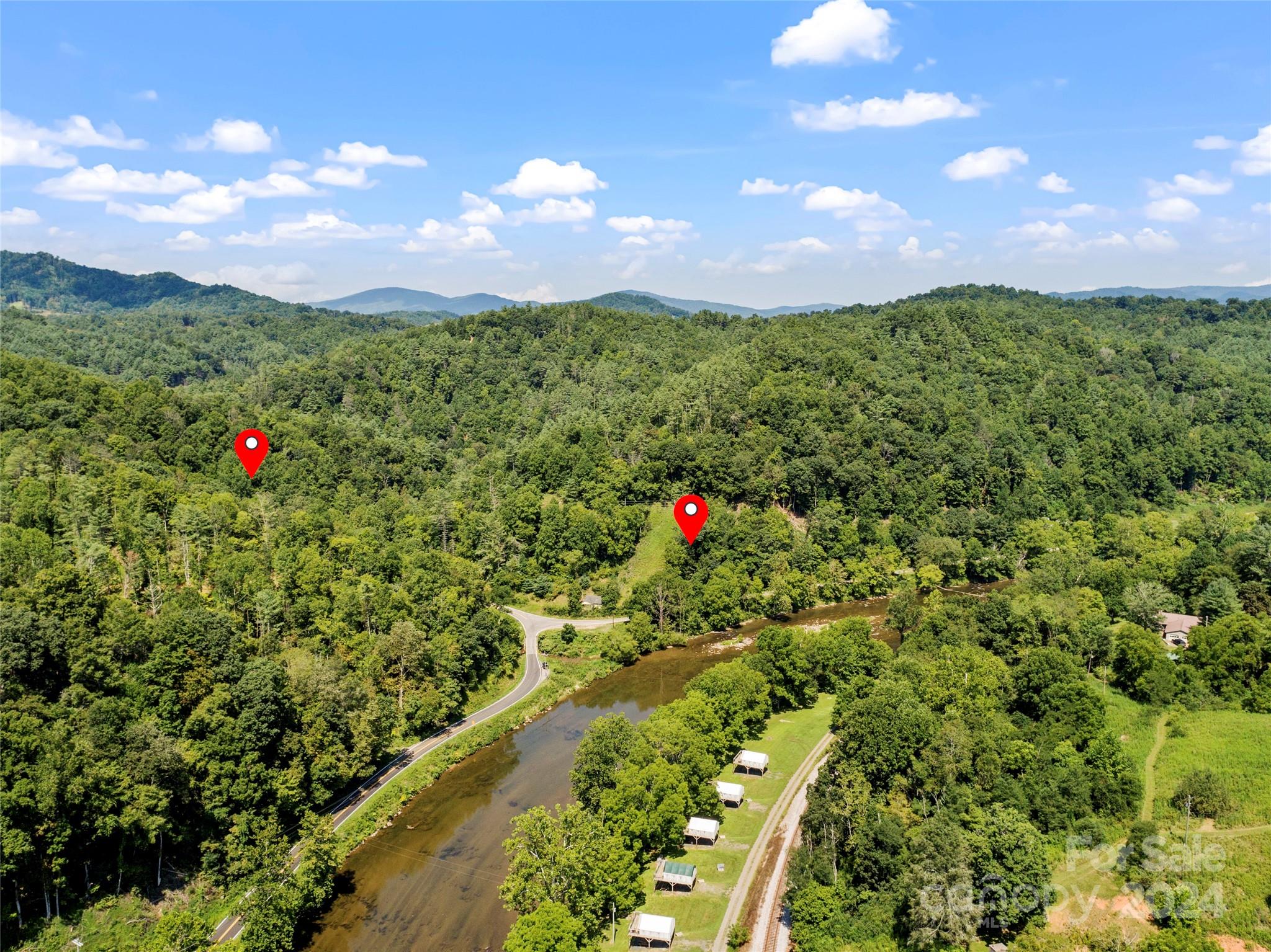 1471 Toe River Road Green Mountain, NC 28740 - Photo 4 of 44 a picture of city and green space