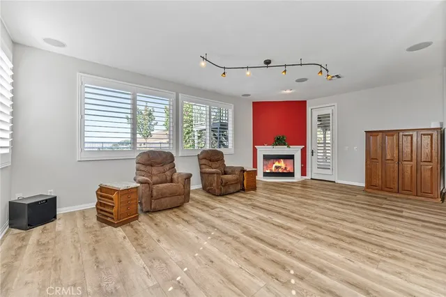 a large kitchen with stainless steel appliances granite countertop a sink and cabinets