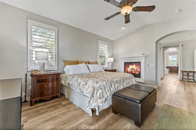 a large bathroom with a double vanity sink large mirror and a bathtub