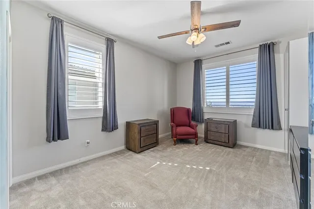 a bathroom with a sink double vanity and a mirror