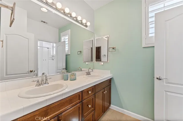 a view of a porch with furniture and backyard