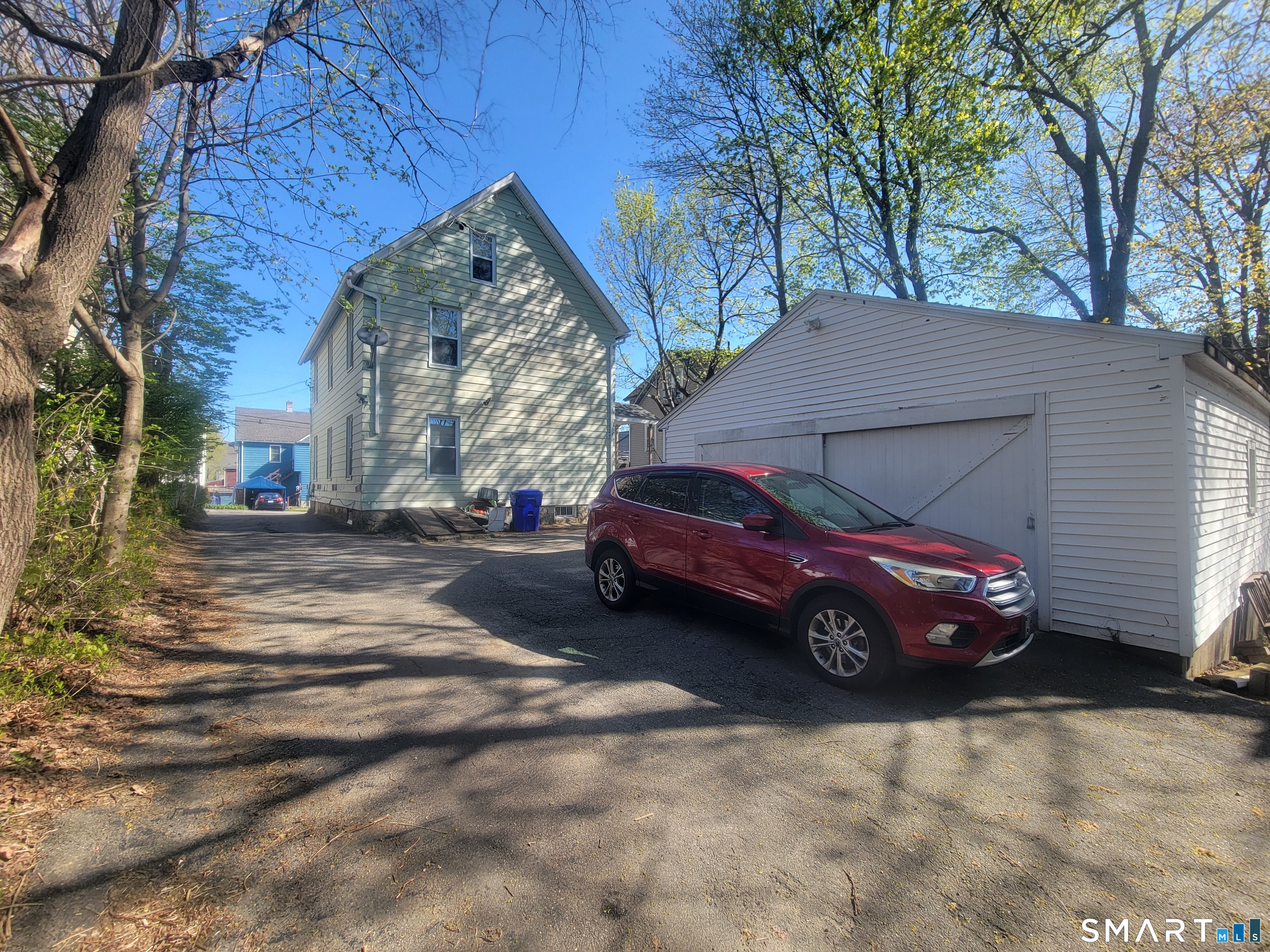 93 Culvert Street Torrington, CT 06790 - Photo 2 of 11 a view of a car in front of house