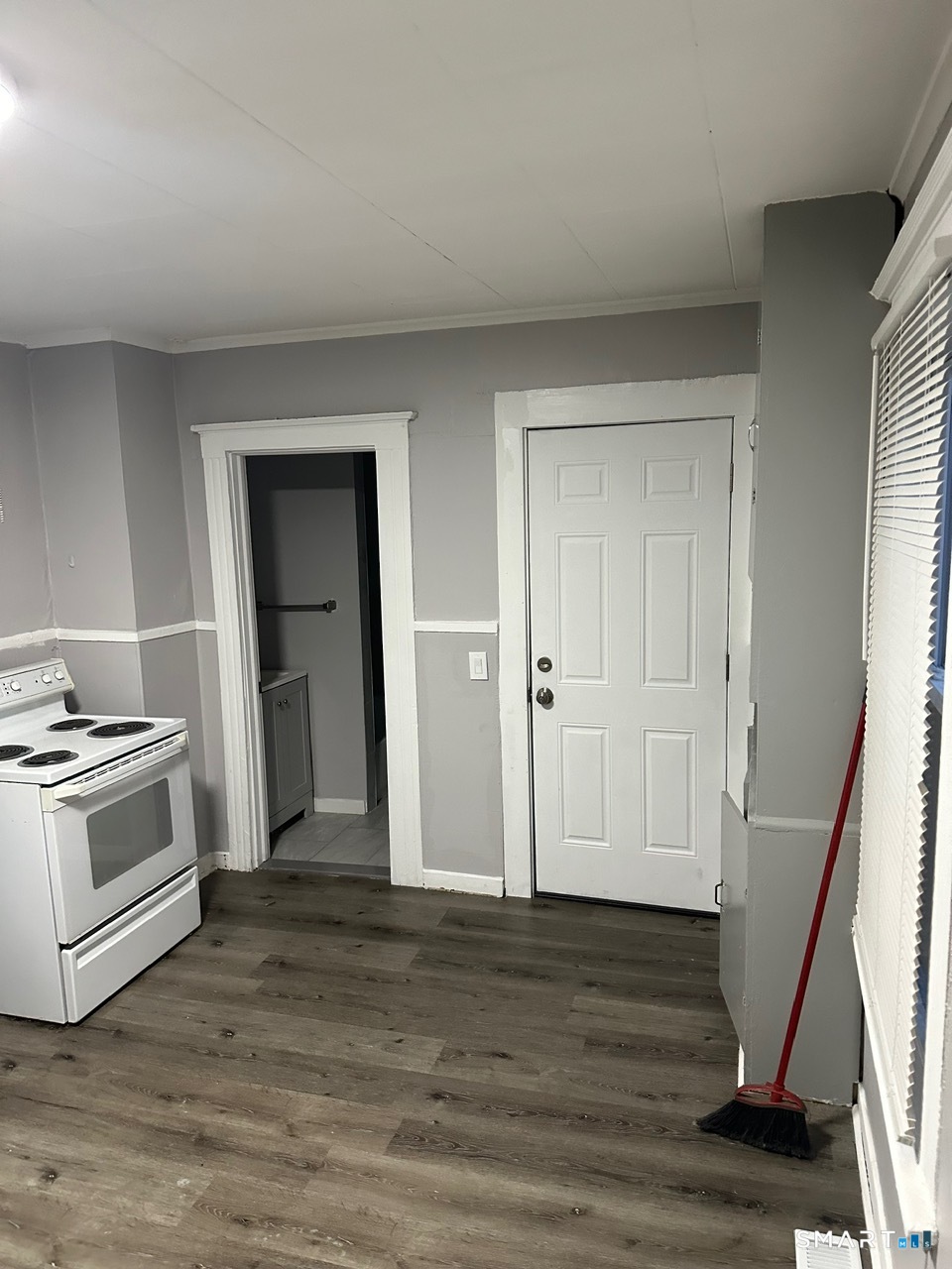 93 Culvert Street Torrington, CT 06790 - Photo 3 of 11 a view of a kitchen from the hallway