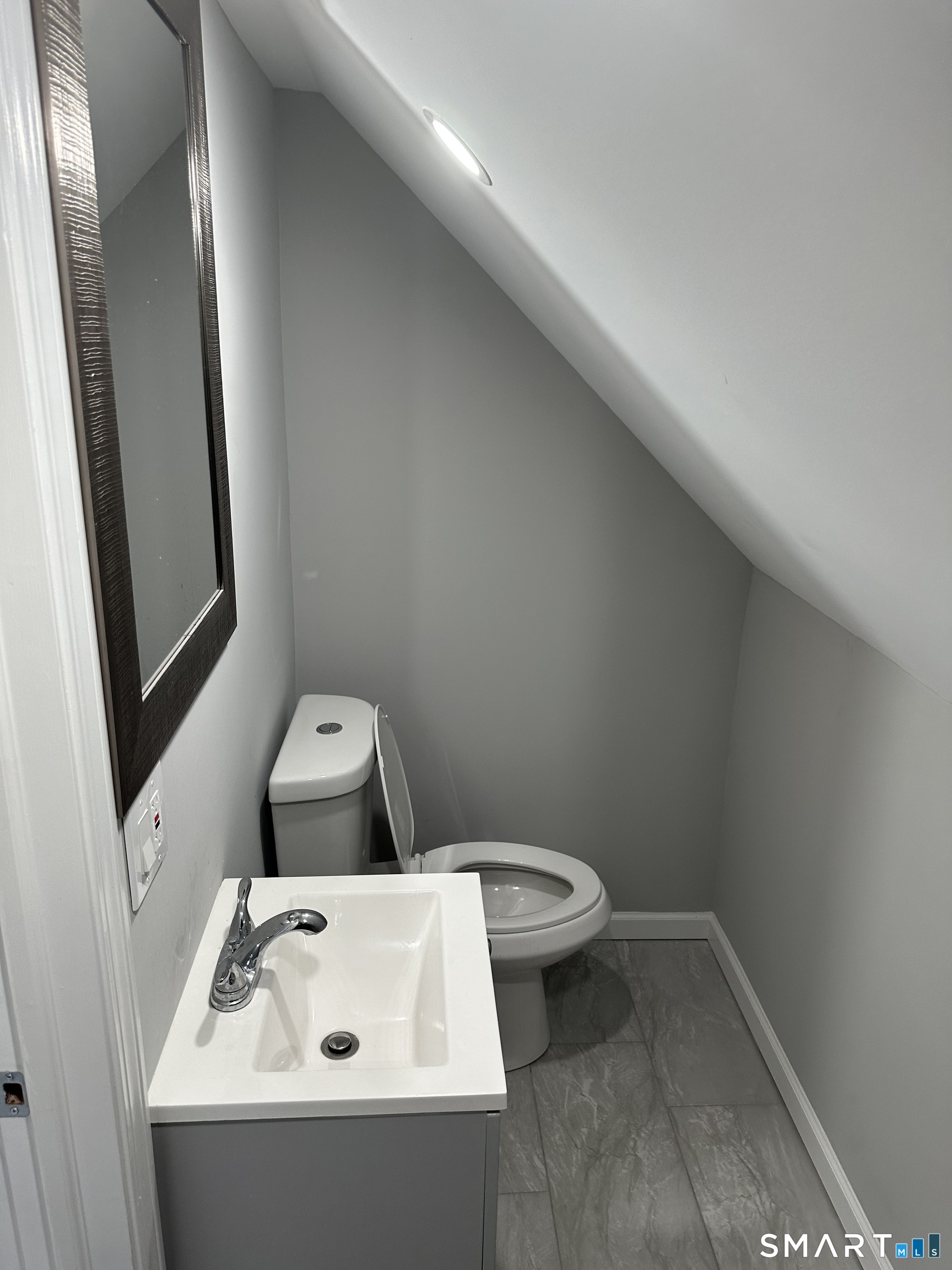 93 Culvert Street Torrington, CT 06790 - Photo 6 of 11 a bathroom with a sink and toilet