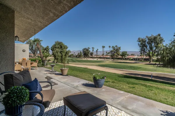 a view of a garden with patio