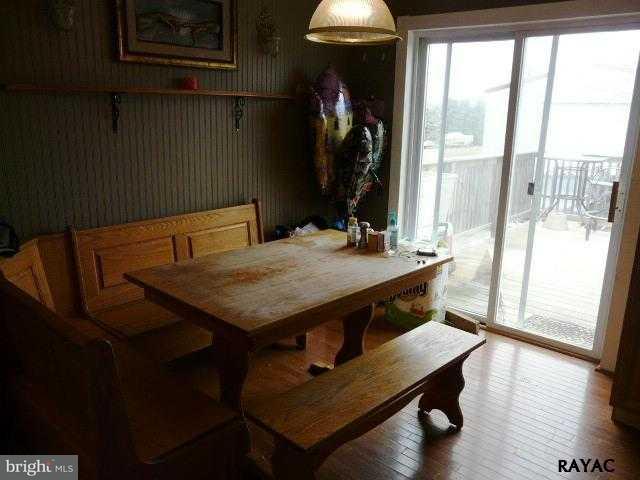 983 Richmond Road Windsor, PA 17366 - Photo 17 of 36 a view of a room with furniture and wooden floor