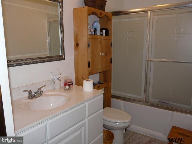 983 Richmond Road Windsor, PA 17366 - Photo 19 of 36 a bathroom with a sink toilet and shower