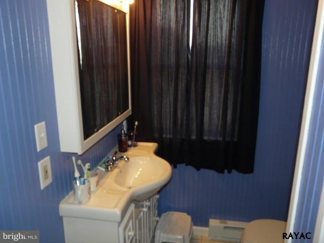 983 Richmond Road Windsor, PA 17366 - Photo 26 of 36 a bathroom with a sink and a mirror