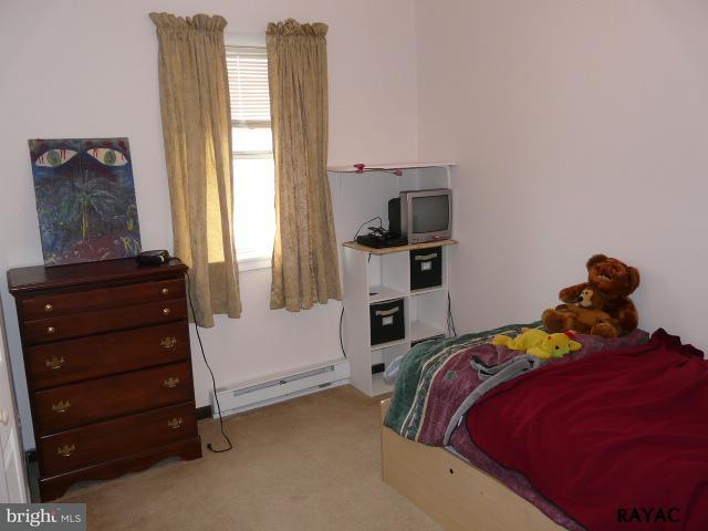 983 Richmond Road Windsor, PA 17366 - Photo 28 of 36 a bedroom with a bed and a window