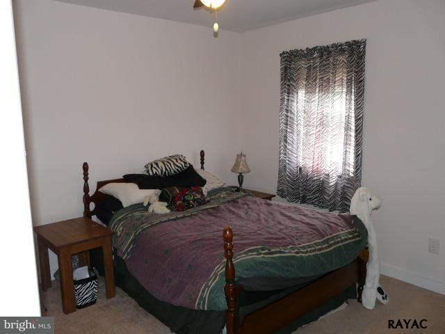 983 Richmond Road Windsor, PA 17366 - Photo 29 of 36 a bedroom with a bed and a window
