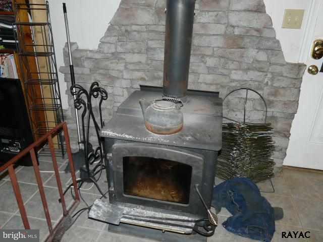 983 Richmond Road Windsor, PA 17366 - Photo 31 of 36 a close view of a fireplace in wooden floor