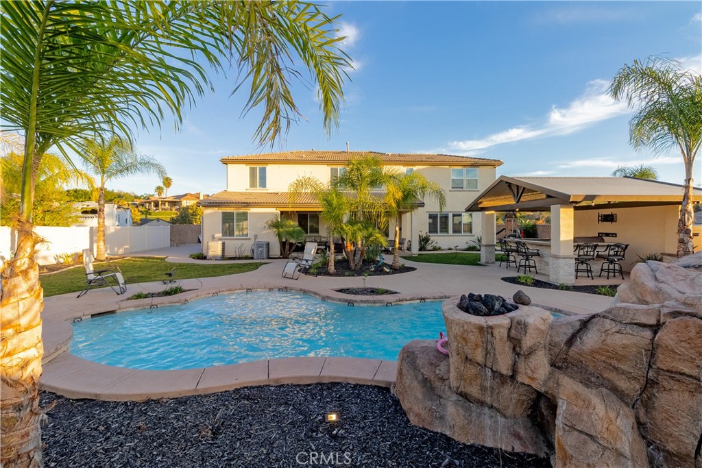 13866 Sweet Avenue Riverside, CA 92503 - Photo 37 of 69 a view of a patio with swimming pool