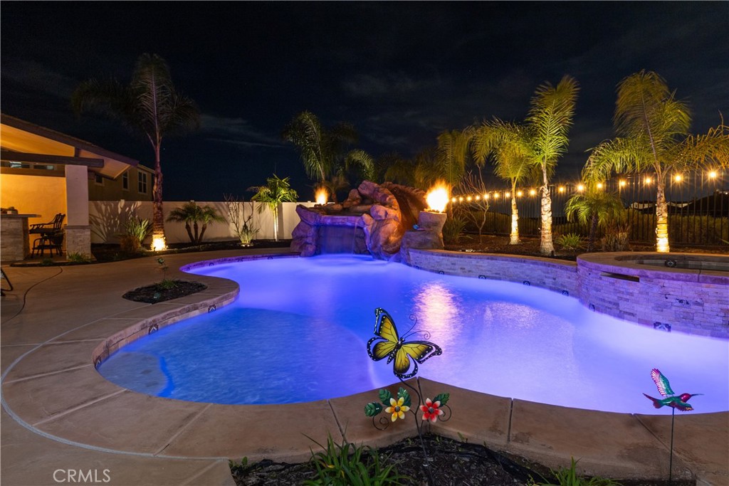 13866 Sweet Avenue Riverside, CA 92503 - Photo 53 of 69 a view of a swimming pool with an outdoor seating