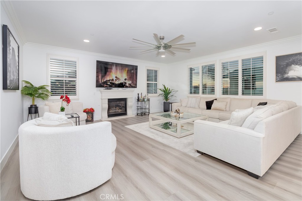 13866 Sweet Avenue Riverside, CA 92503 - Photo 8 of 69 a living room with fireplace furniture and a flat screen tv