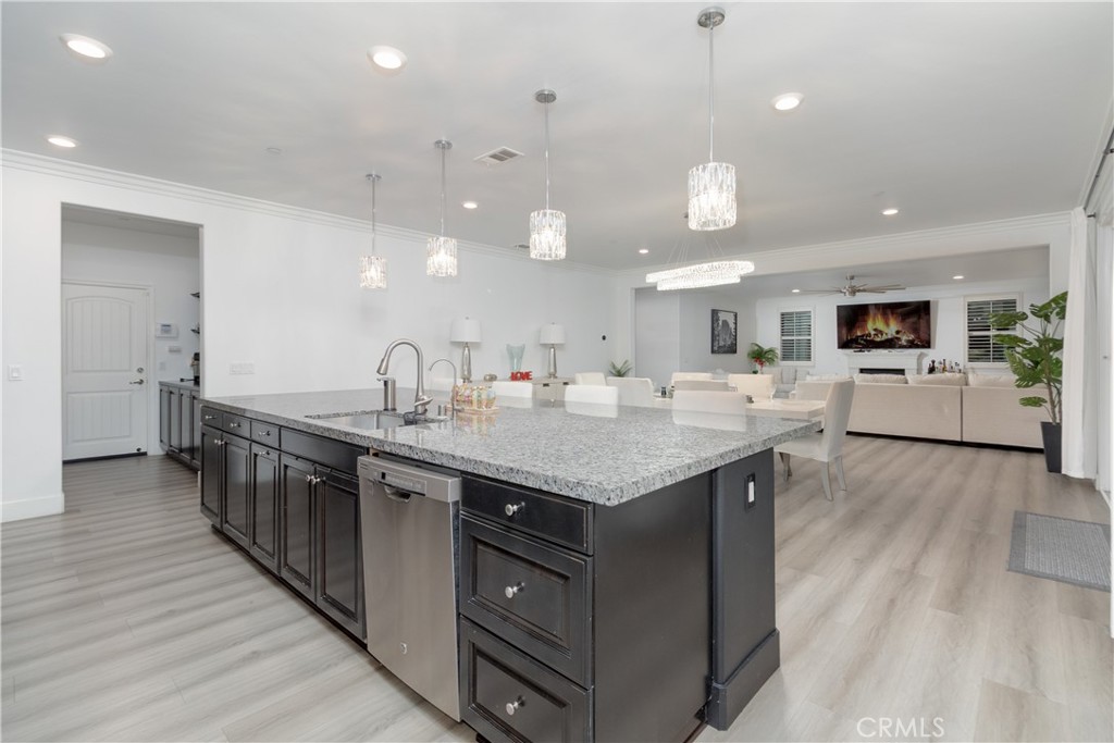 13866 Sweet Avenue Riverside, CA 92503 - Photo 10 of 69 a kitchen with lots of counter space a sink and appliances