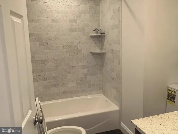 a bathroom with a bathtub