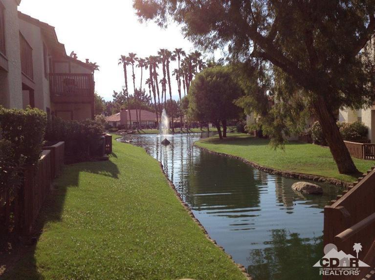 43376 Cook Street, Unit 96 Palm Desert, CA 92211 - Photo 18 of 29 a view of a park with large trees