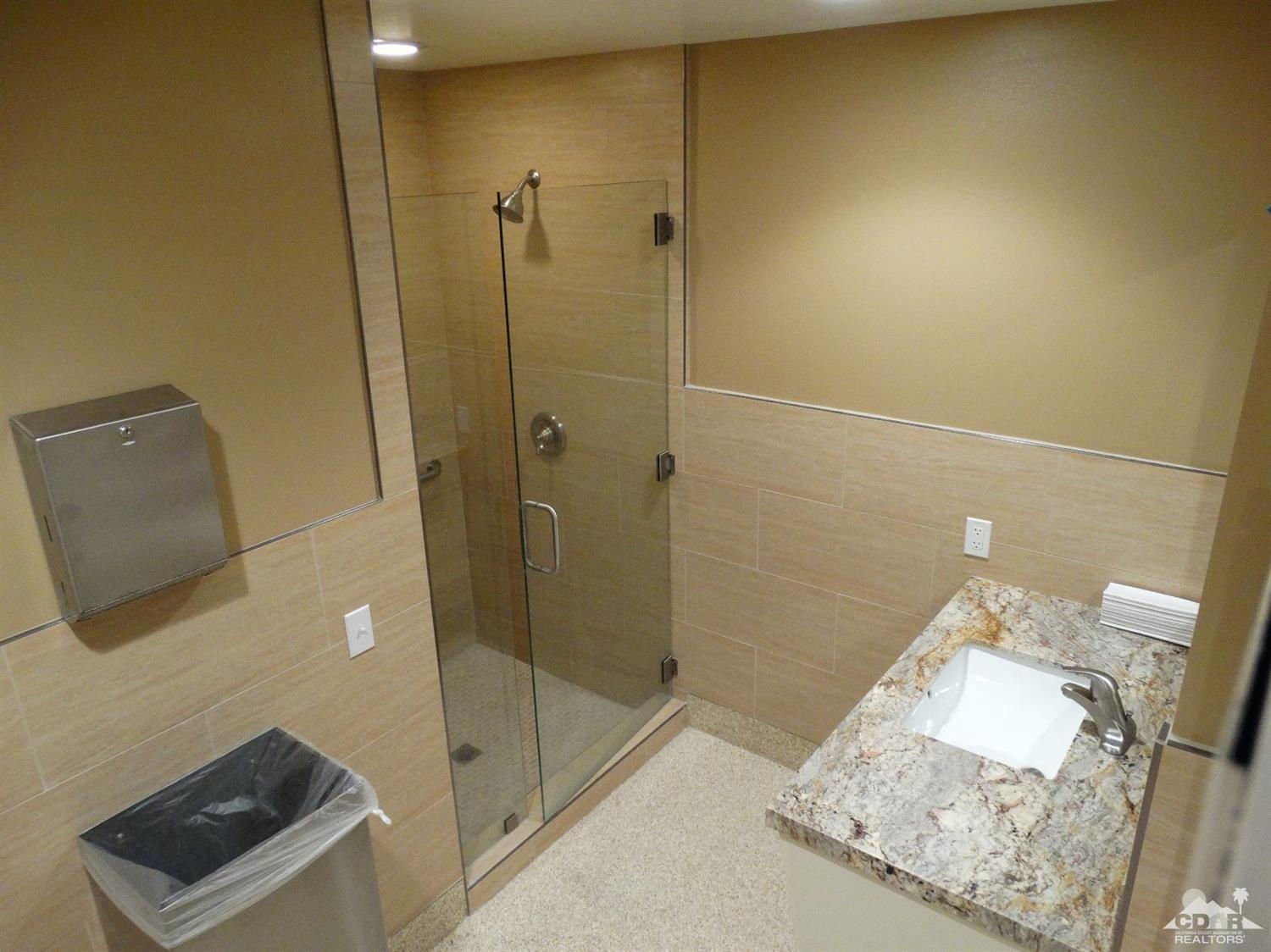 43376 Cook Street, Unit 96 Palm Desert, CA 92211 - Photo 25 of 29 a bathroom with a shower