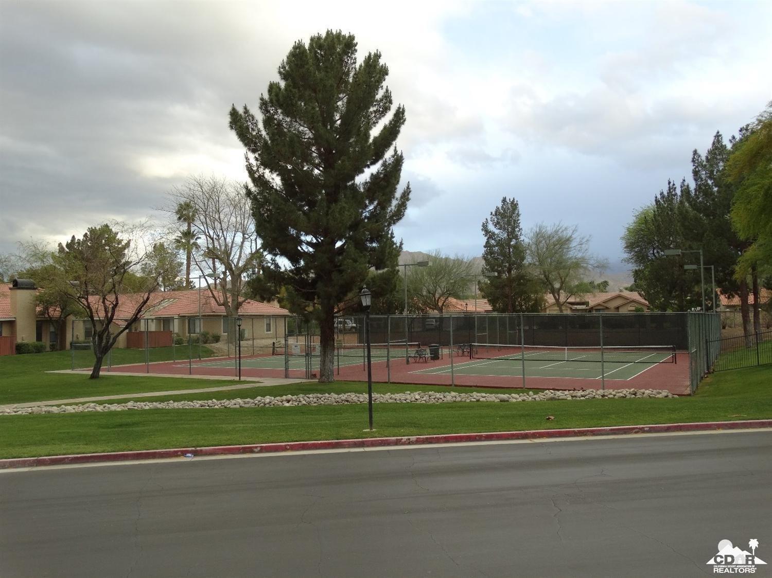 43376 Cook Street, Unit 96 Palm Desert, CA 92211 - Photo 26 of 29 a view of a yard