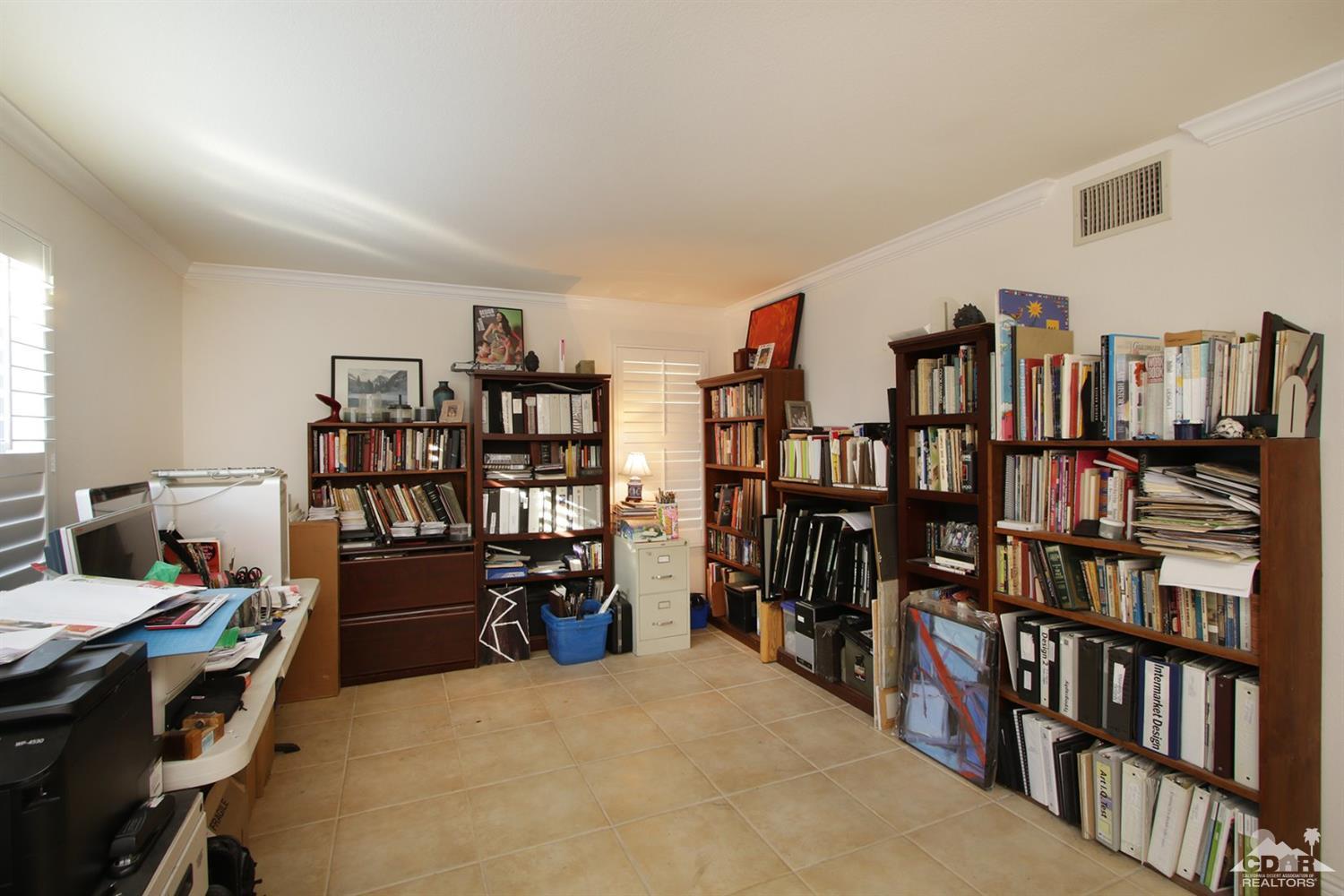 43376 Cook Street, Unit 96 Palm Desert, CA 92211 - Photo 6 of 29 a view of a workspace with furniture and toys