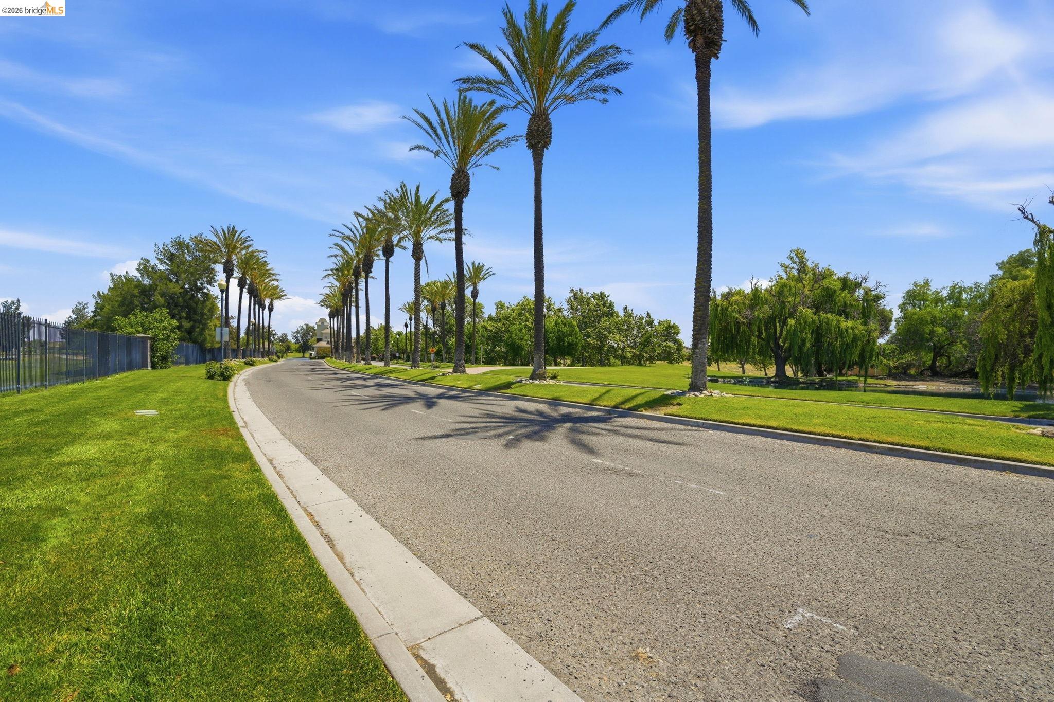 1024 Diamante Rio Vista, CA 94571 - Photo 26 of 27 Paved street with concrete curb bordered by extensive green lawns
