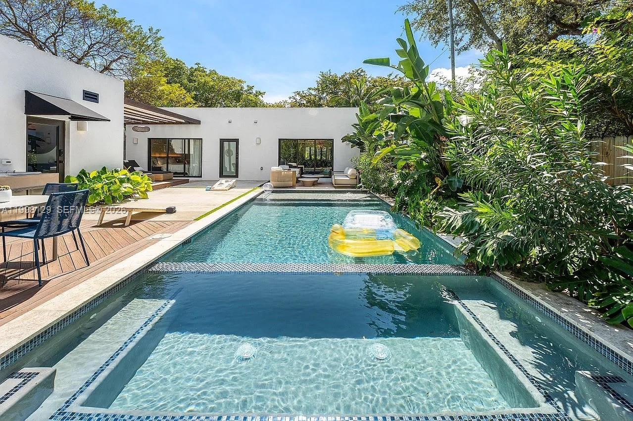 445 Northeast 76th Street Miami, FL 33138 - Photo 57 of 63 a view of swimming pool with sitting area