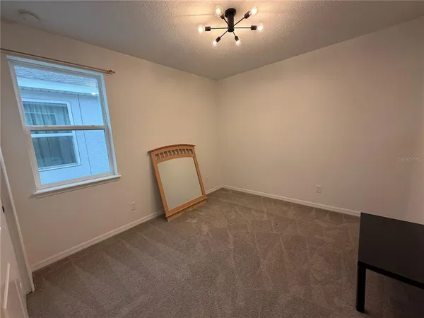 a view of a livingroom with furniture