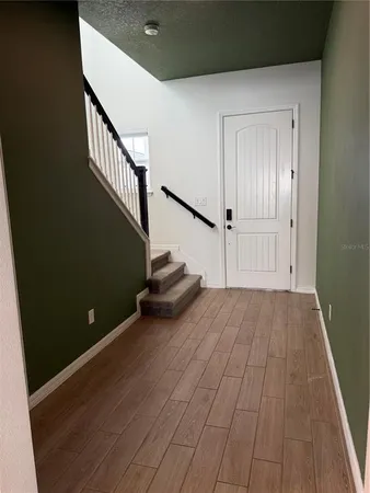 a view of front door and stairs