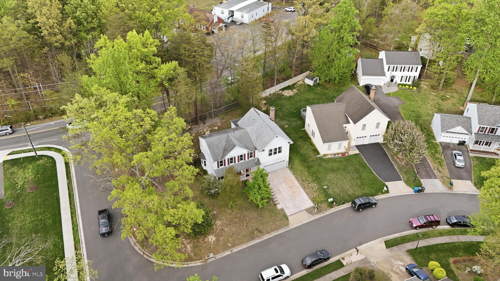 8664 Pohick Forest Court Springfield, VA 22153 - Photo 4 of 41 an aerial view of a house with garden space and street view