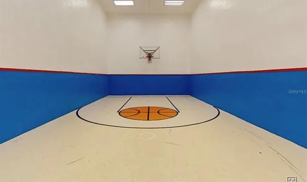 a view of a room with a cabinetry and a table