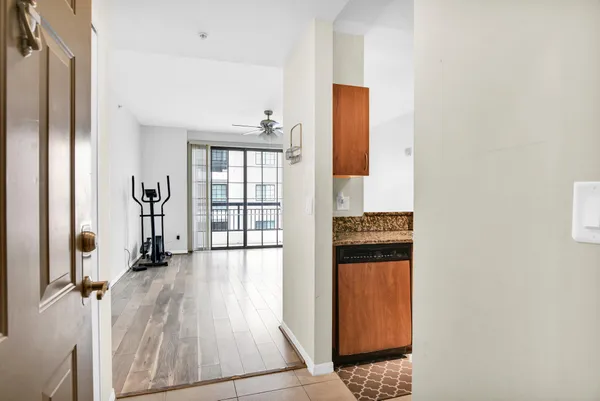 a view of an empty room with a window