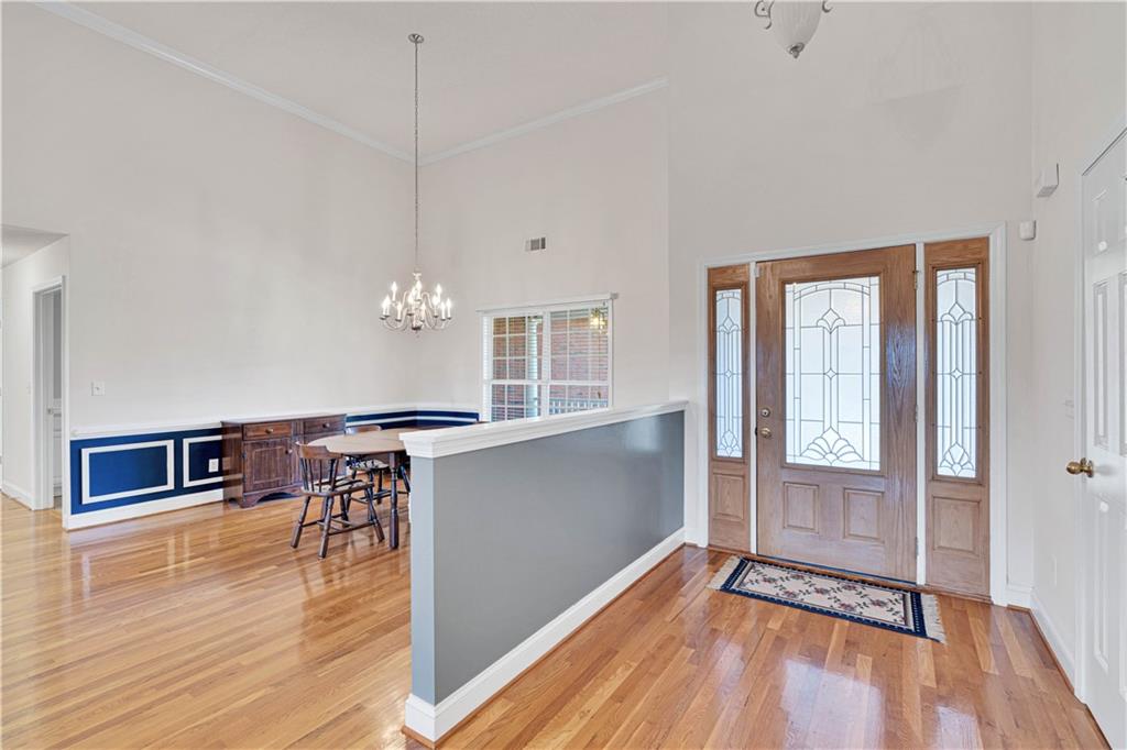 523 Barhams Ridge Drive McDonough, GA 30252 - Photo 11 of 43 a view of a room with wooden floor and staircase