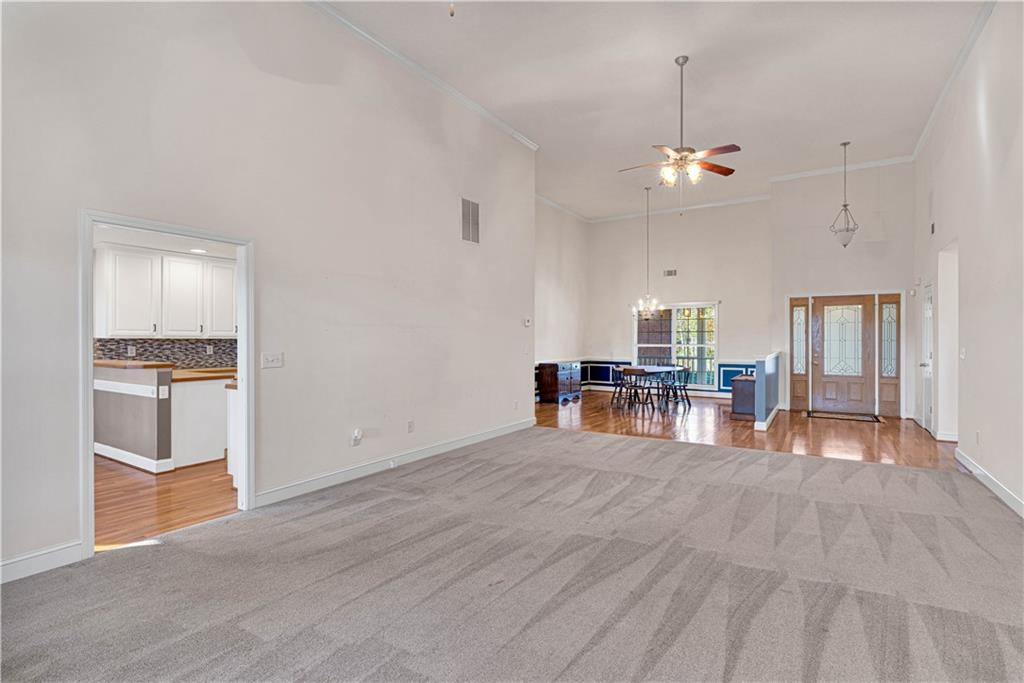 523 Barhams Ridge Drive McDonough, GA 30252 - Photo 13 of 43 a view of a kitchen with furniture and wooden floor