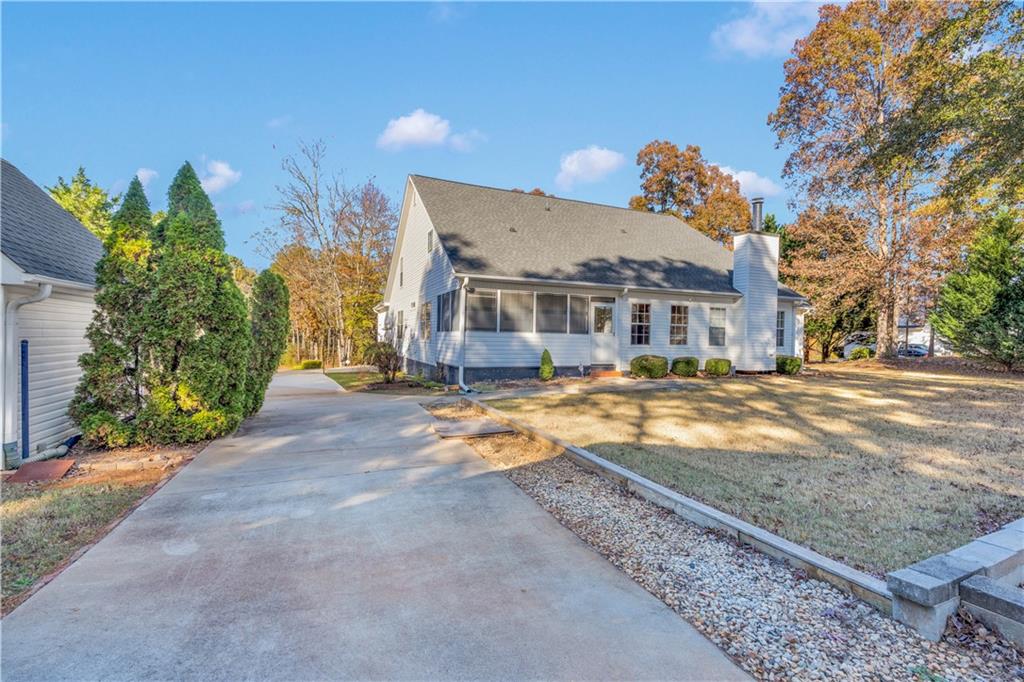 523 Barhams Ridge Drive McDonough, GA 30252 - Photo 15 of 43 a view of a house with a yard and large tree