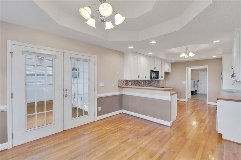 523 Barhams Ridge Drive McDonough, GA 30252 - Photo 18 of 43 a large kitchen with kitchen island a sink stainless steel appliances and cabinets